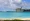 Plane lands over St. Jean Bay to St. Barts Airport
