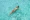 Woman enjoying the perfect weather floating in Caribbean Sea
