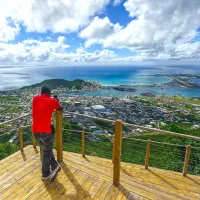 Man overlooks St. Maarten from a viewpoint in 2025